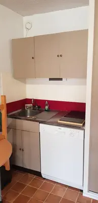 Cuisine ou kitchenette dans l'établissement Studio Aussois chaleureux