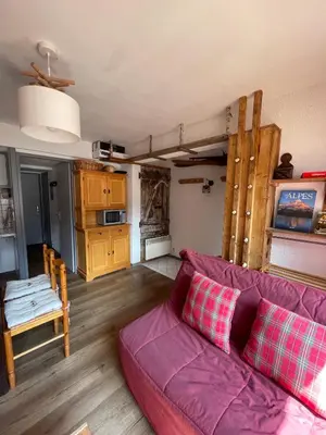 Coin salon dans l'établissement Appartement 4 à 6 P proche télécabine et centre