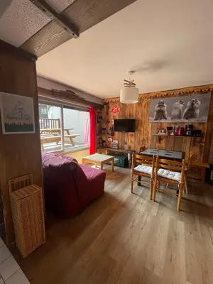 Coin salon dans l'établissement Appartement 4 à 6 P proche télécabine et centre