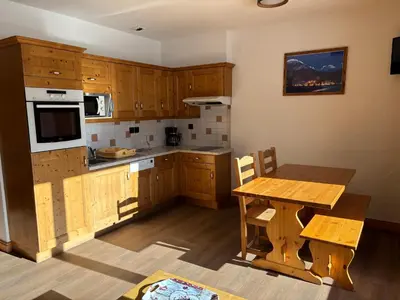 Cuisine ou kitchenette dans l'établissement Montana 1