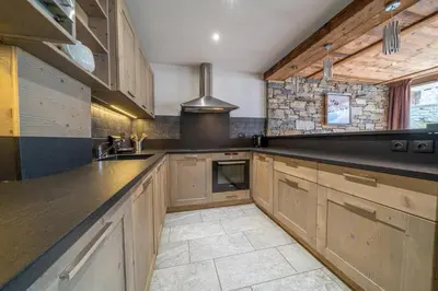 Cuisine ou kitchenette dans l'établissement Appartement Le Rosset