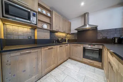 Cuisine ou kitchenette dans l'établissement Appartement Le Rosset