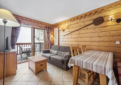 Coin salon dans l'établissement Appartement Ecrin B112