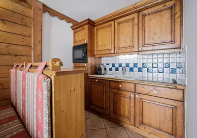 Cuisine ou kitchenette dans l'établissement Appartement Ecrin B112