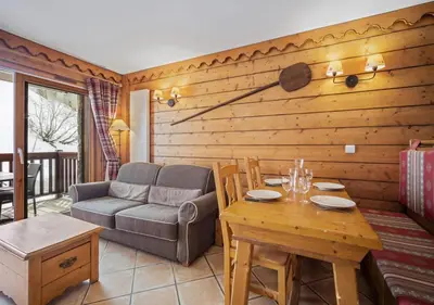 Coin salon dans l'établissement Appartement Ecrin B112