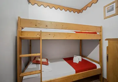 Un ou plusieurs lits dans un hébergement de l'établissement Appartement Ecrin B112