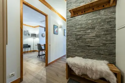 Un ou plusieurs lits dans un hébergement de l'établissement Appartement 4-5 personnes skis aux pieds piscine intérieure sauna hammam