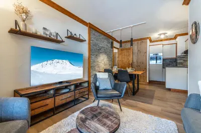 Coin salon dans l'établissement Appartement 4-5 personnes skis aux pieds piscine intérieure sauna hammam