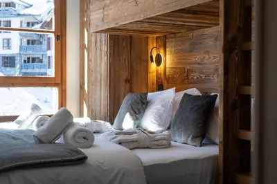 Un ou plusieurs lits dans un hébergement de l'établissement Appartement 4-5 personnes skis aux pieds piscine intérieure sauna hammam