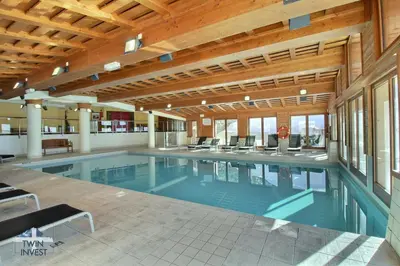 Piscine de l'établissement ARC 1950 Appartement 2 chambres cabine 8 personnes ou située à proximité