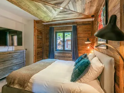 Un ou plusieurs lits dans un hébergement de l'établissement Duplex de Luxe à Val-d'Isère avec Jacuzzi et Hammam - FR-1-694-357