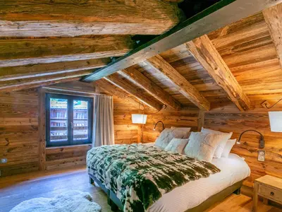 Un ou plusieurs lits dans un hébergement de l'établissement Duplex de Luxe à Val-d'Isère avec Jacuzzi et Hammam - FR-1-694-357