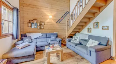 Coin salon dans l'établissement Résidence Blue Wood - Appartement en chalet 8 personnes 4, séjour enfamille ou entre amis MAE-0701