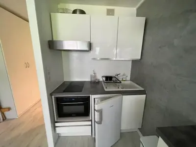 Cuisine ou kitchenette dans l'établissement Superbe studio 4 pers skis aux pieds avec balcon