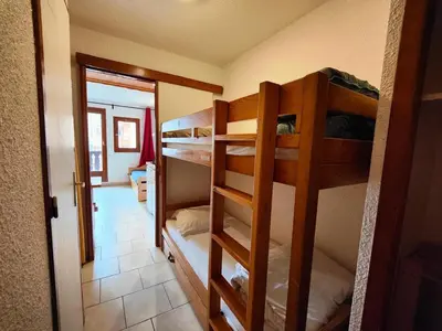 Un ou plusieurs lits superposés dans un hébergement de l'établissement Chalet Club Iv - Blanchot - Studio · Proches des pistes et commerces · Balcon MAE-8751