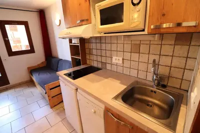 Cuisine ou kitchenette dans l'établissement Chalet Club Iv - Blanchot - Studio · Proches des pistes et commerces · Balcon MAE-8751