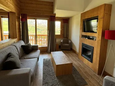 Coin salon dans l'établissement Appartement 3P, piscine chauffée, animaux admis, pieds des pistes - FR-1-181-2819