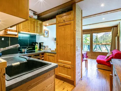 Cuisine ou kitchenette dans l'établissement Charmant appartement avec wifi, skis aux pieds à Val-d'Isère - FR-1-694-361