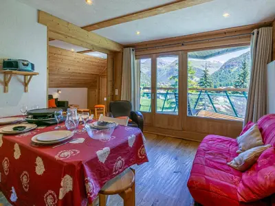 Coin salon dans l'établissement Charmant appartement avec wifi, skis aux pieds à Val-d'Isère - FR-1-694-361