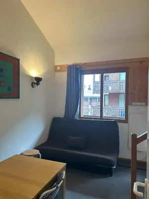 Coin salon dans l'établissement Au pied des pistes