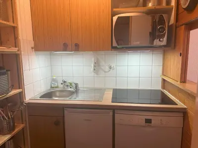 Cuisine ou kitchenette dans l'établissement Au pied des pistes
