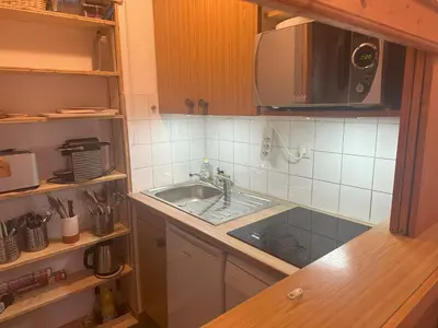 Cuisine ou kitchenette dans l'établissement Au pied des pistes