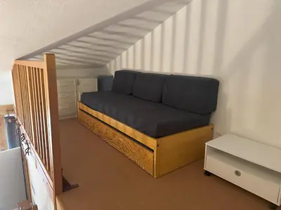 Coin salon dans l'établissement Au pied des pistes