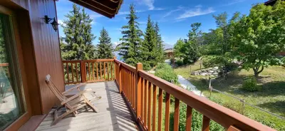 Balcon ou terrasse dans l'établissement Duplex Luxueux 200m2 Niché sur les Pistes - Paradis Lodge pour 14 Personnes