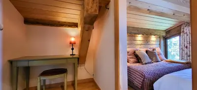 Un ou plusieurs lits dans un hébergement de l'établissement Duplex Luxueux 200m2 Niché sur les Pistes - Paradis Lodge pour 14 Personnes