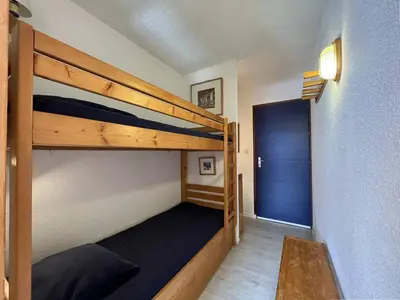 Un ou plusieurs lits dans un hébergement de l'établissement Location Studio 4 pers avec balcon à Plan Peisey - FR-1-757-105