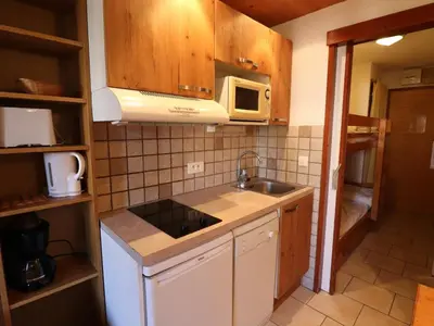 Cuisine ou kitchenette dans l'établissement Studio confortable, proche pistes & commerces, balcon - FR-1-502-574