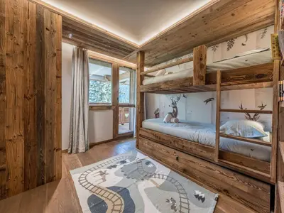 Un ou plusieurs lits dans un hébergement de l'établissement Duplex Ski in/out 5 pers, 2 ch, 3 sdb, Balcon, WIFI - Courchevel 1650 - FR-1-631-208