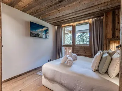 Un ou plusieurs lits dans un hébergement de l'établissement Duplex Ski in/out 5 pers, 2 ch, 3 sdb, Balcon, WIFI - Courchevel 1650 - FR-1-631-208