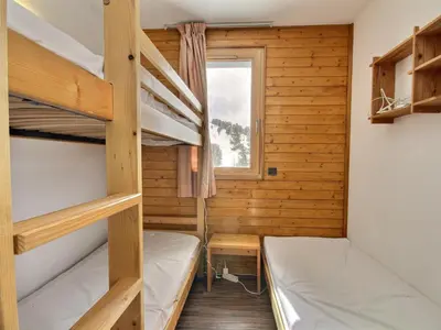 Un ou plusieurs lits dans un hébergement de l'établissement Appartement cosy 2 pièces au cœur de Belle Plagne, 4 pers, au pied des pistes - FR-1-455-258