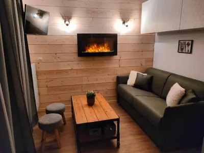 Coin salon dans l'établissement Appartement 5 p Belle Plagne Skis aux pieds
