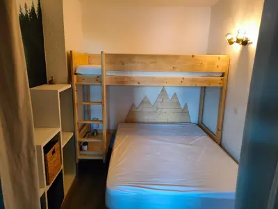 Un ou plusieurs lits dans un hébergement de l'établissement Appartement 5 p Belle Plagne Skis aux pieds