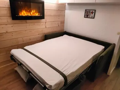 Un ou plusieurs lits dans un hébergement de l'établissement Appartement 5 p Belle Plagne Skis aux pieds