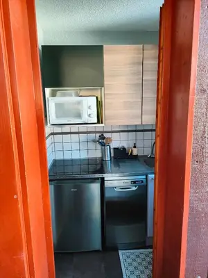 Cuisine ou kitchenette dans l'établissement Appartement 5 p Belle Plagne Skis aux pieds