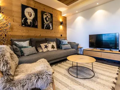Télévision ou salle de divertissement dans l'établissement Appartement standing calme avec terrasse et espace bien-être - FR-1-346-577