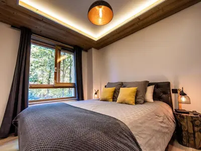 Un ou plusieurs lits dans un hébergement de l'établissement Appartement standing calme avec terrasse et espace bien-être - FR-1-346-577