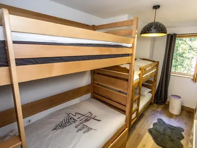 Un ou plusieurs lits dans un hébergement de l'établissement Appartement standing calme avec terrasse et espace bien-être - FR-1-346-577