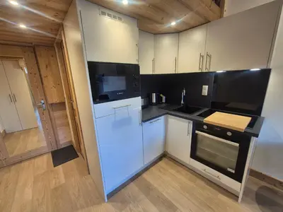 Cuisine ou kitchenette dans l'établissement Studio rénové avec mezzanine et wifi, au pied des pistes avec balcon - FR-1-502-582