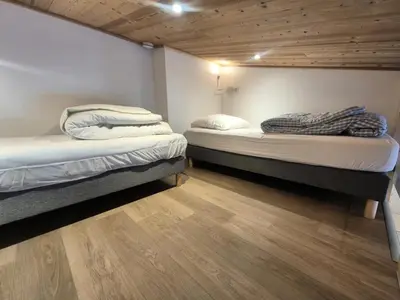 Un ou plusieurs lits dans un hébergement de l'établissement Résidence Curling B Tour - Studio rénové · Pieds des pistes · Balcon MAE-8151