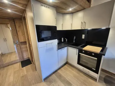 Cuisine ou kitchenette dans l'établissement Résidence Curling B Tour - Studio rénové · Pieds des pistes · Balcon MAE-8151