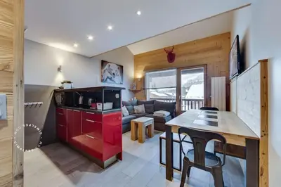 Cuisine ou kitchenette dans l'établissement Appartement Val d Isère Centre 4 pièces parking 8 personnes 5min à pied du front de neige