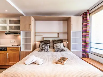 Un ou plusieurs lits dans un hébergement de l'établissement Studio Le Pramecou - Val Claret-16 by Interhome