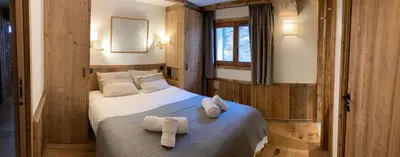 Un ou plusieurs lits dans un hébergement de l'établissement Chalet Les Martin's 1