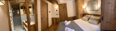 Un ou plusieurs lits dans un hébergement de l'établissement Chalet Les Martin's 1