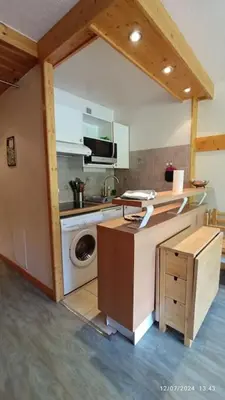 Cuisine ou kitchenette dans l'établissement Joli appartement situé à l'entrée du Val Claret