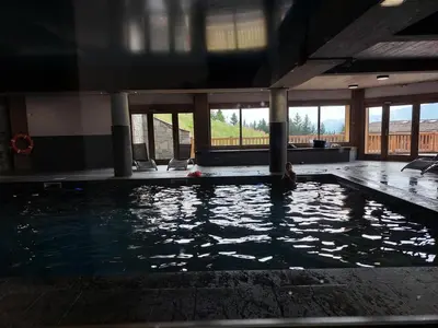 Piscine de l'établissement Résidence L'iseran - Spacieux 4 pièces, pieds des pistes, résidence haut de gamme avec piscine, vue splendide sur le Mont Blanc et terrasse Ouest. MAE-8921 ou située à proximité